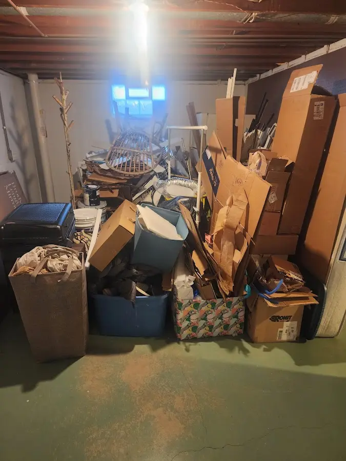 Roll-off dumpster container at job site for 4 Yard Dumpster Rental in Vicksburg